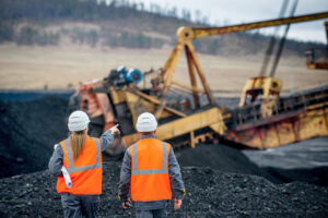 Coal mine workers in an open pit