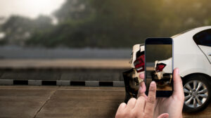 taking photo of a damage car due to accident